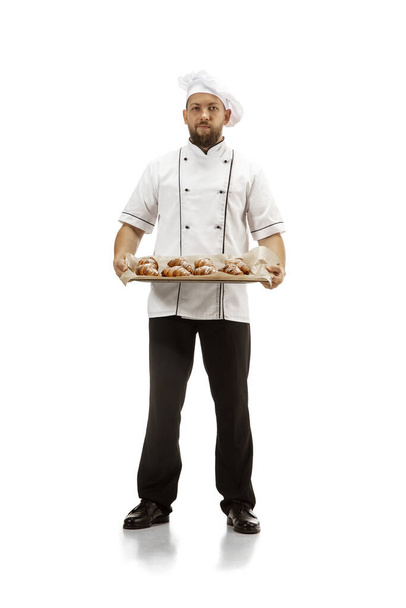 Cooker, chef, baker in uniform isolated on white background, gourmet. - Photo, image