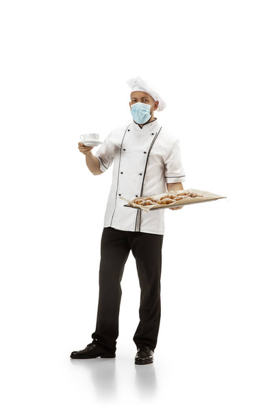 Cooker, chef, baker in uniform isolated on white background, gourmet. - Valokuva, kuva