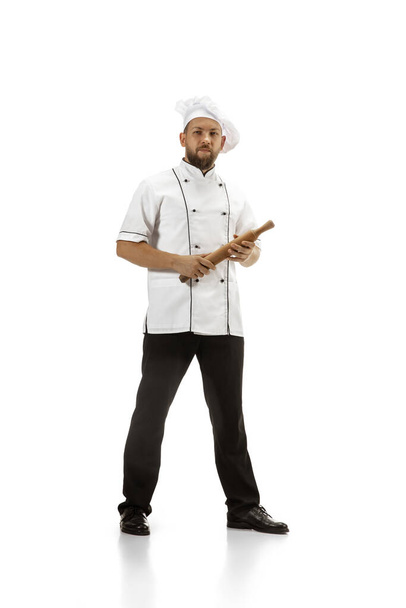 Cooker, chef, baker in uniform isolated on white background, gourmet. - 写真・画像