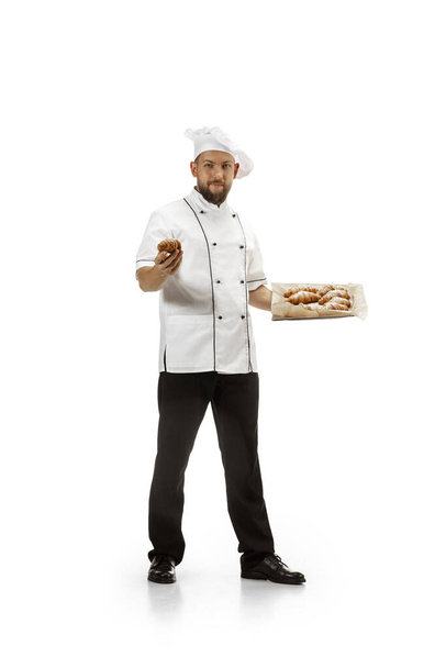 Cooker, chef, baker in uniform isolated on white background, gourmet. - Фото, изображение