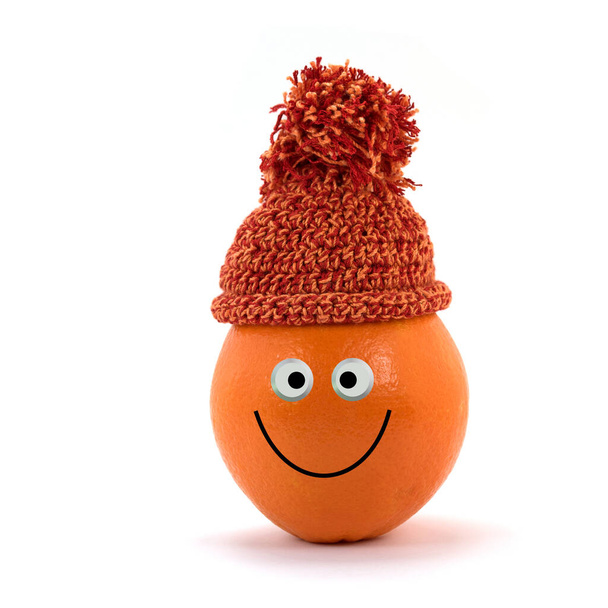Pomeranč s kloboukem a legrační tváří - Fotografie, Obrázek