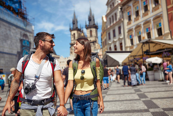 Happy tourist man and woman in love having fun, travel, smiling on vacation. - Foto, imagen