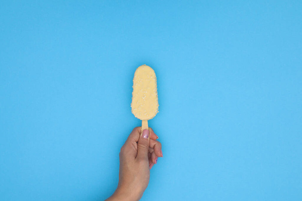 Delicious ice cream in woman hand - Fotó, kép