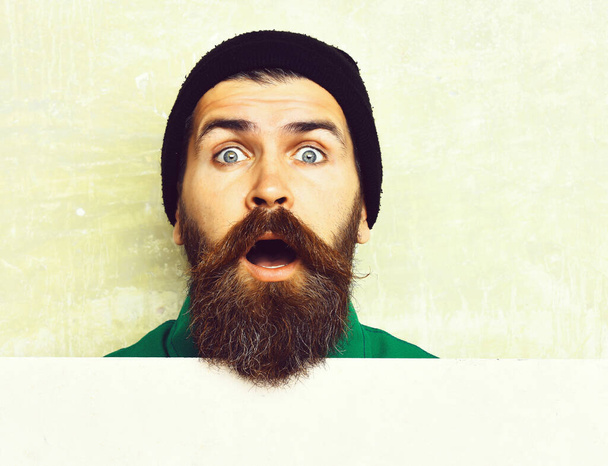 bearded man posing on studio wall background - Фото, изображение