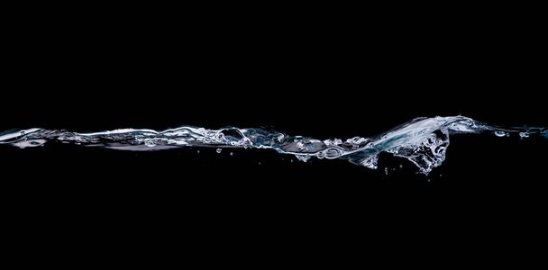 Water drinking, Water wave splash isolated black background. - Fotó, kép