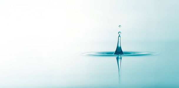Water droplets on surface water background - Foto, immagini