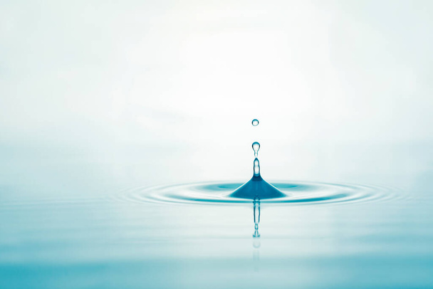 Water droplets on surface water background - Valokuva, kuva