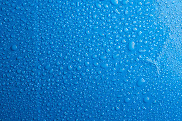 νερό σταγόνες μπλε φόντο - Φωτογραφία, εικόνα