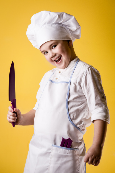 Little boy chef in uniform - Valokuva, kuva