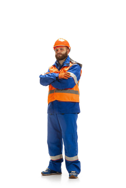Handsome contractor, builder isolated over white studio background - Foto, afbeelding