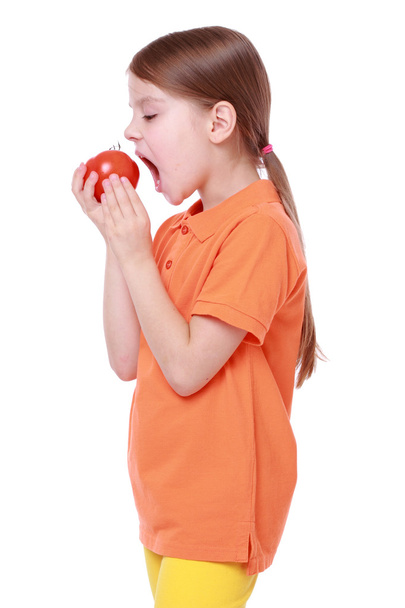 Girl holding tomato - Photo, Image