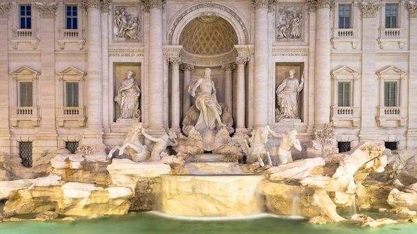 Rome, Italy. Trevi fountain at night, the masterpiece of Italian classical baroque architecture. - 写真・画像