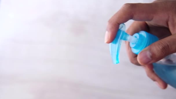 close up of young man hand using sanitizer gel for preventing virus  - Metraje, vídeo