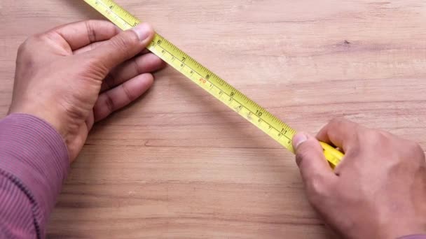measurements on a wood with a tape measure tools. - Footage, Video