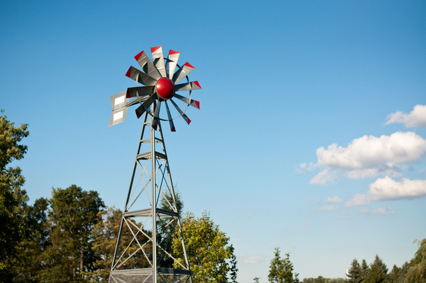 Small Windmill with Blue Sky and Clouds - Photo, Image