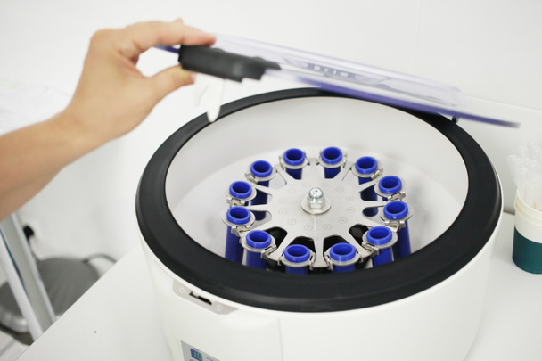 Laboratory medical centrifuge for the separation of blood components. High quality photo - Photo, Image