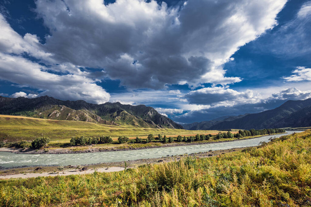 Cloudy sky over the river Katun. Place Oractical bridge, Chemal district of the Altai Republic - Фото, зображення