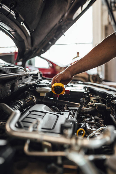 Auto mechanic hands, car technical inspection in service  - Φωτογραφία, εικόνα