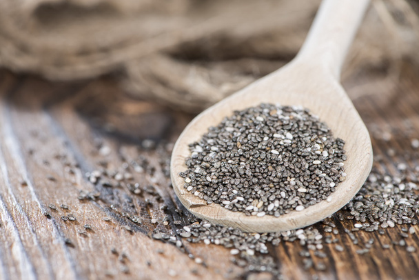 Chia Seeds on a wooden spoon - Photo, image