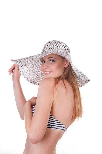 Beautiful girl in a bathing suit and hat - Фото, изображение