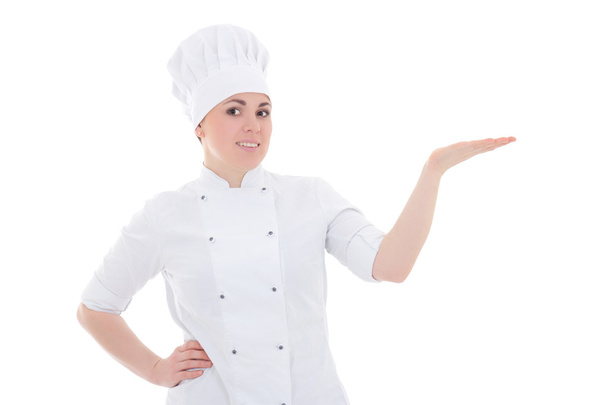 młody kucharz kobieta pokazując lub przedstawiając coś na białym tle na whi - Zdjęcie, obraz