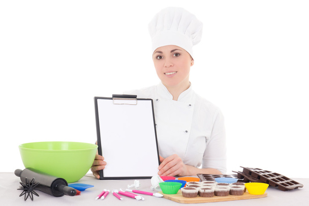 ελκυστική γυναίκα ζαχαροπλάστη με τη στολή μάγειρας που κάθεται στο κι η - Foto, Bild