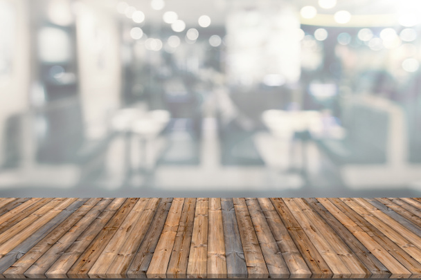Wooden table with blur restaurant background - Photo, Image