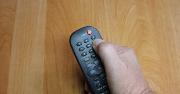Controle remoto preto operado à mão para entretenimento  - Filmagem, Vídeo