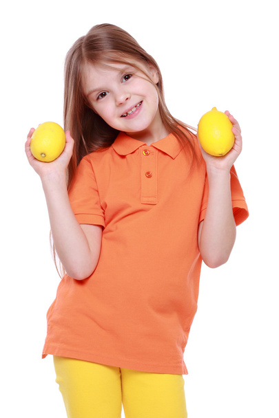 Girl with lemons - Foto, Imagem