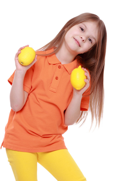 Girl with lemons - Foto, Imagem