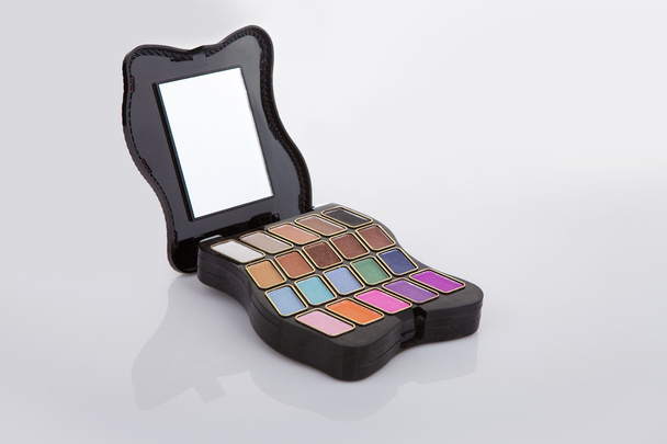 Colorful eyeshadow palette on gray background - Foto, immagini