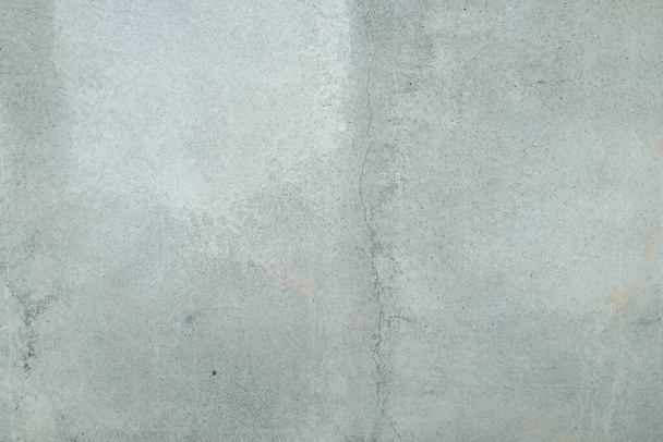 Texture of a smooth gray concrete wall as background or wallpaper. Close up of concrete wall with rough texture. Cement texture. - Fotó, kép