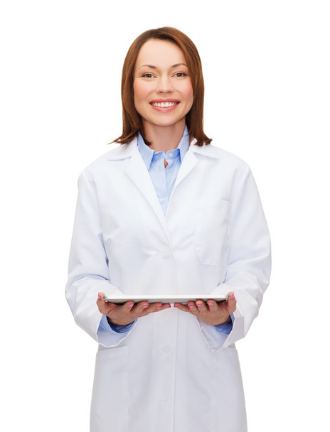 Smiling female doctor and tablet pc computer - Fotó, kép