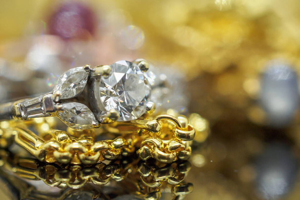 Luxury gold Jewelry diamond rings with reflection on black background - Photo, Image