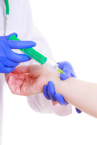 Hands of doctor nurse with syringe giving injection to patient - Foto, immagini