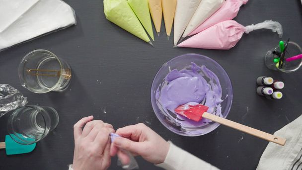 Step by step. Flat lay. Pouring royal icing into the piping bag to decorate sugar cookies. - Photo, Image