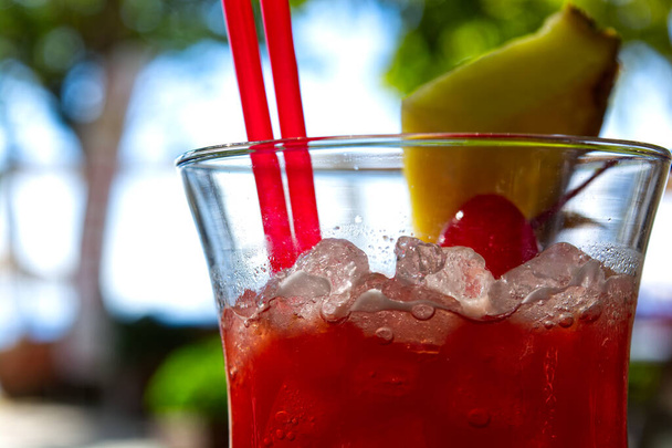 Non-alcoholic cocktail drink with Pineapple and cherry fruits - Foto, imagen