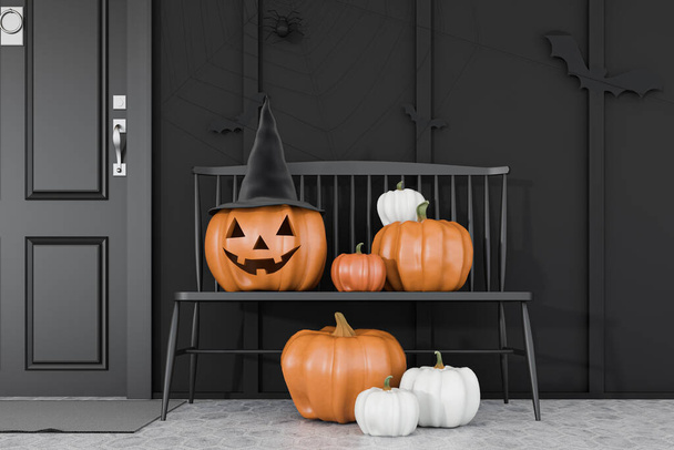 Carved pumpkins, bats and spiders on black bench near black front door of modern house with black walls. Concept of halloween. 3d rendering - Фото, изображение