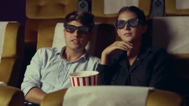 Man and woman in the cinema watching a 3D movie - Footage, Video