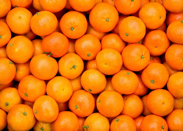 Texture d'oranges mandarines fraîches. Fond fruits orange. - Photo, image