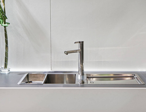 Modern sink with faucet in white kitchen - Φωτογραφία, εικόνα