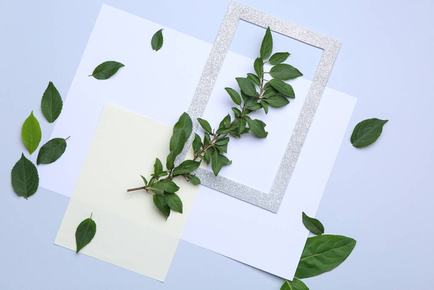 Composition with green leaves on light background - Photo, Image