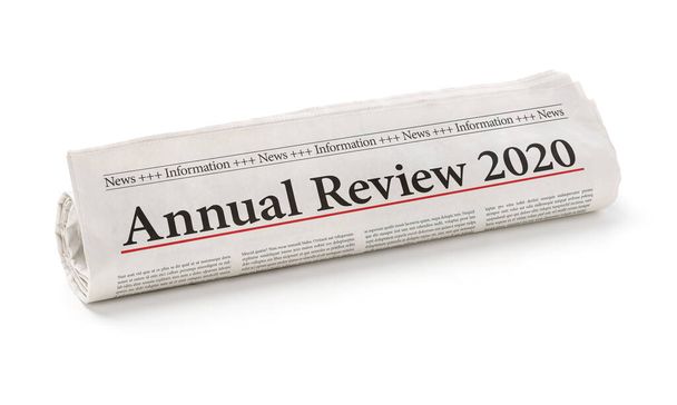 2020 Yıllık Değerlendirme başlığı ile yuvarlanmış gazete - Fotoğraf, Görsel