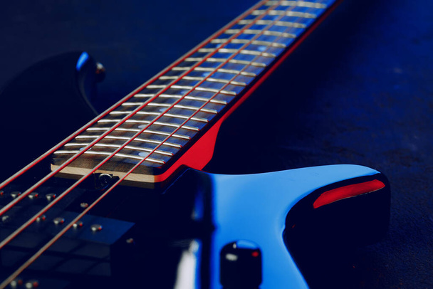 Guitar fingerboard with strings close up photo - 写真・画像