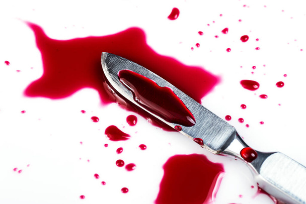 Murder. Knife in pool of blood - Fotoğraf, Görsel