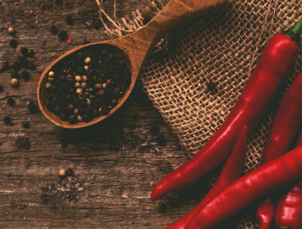 Chili pepper on the table - Фото, зображення