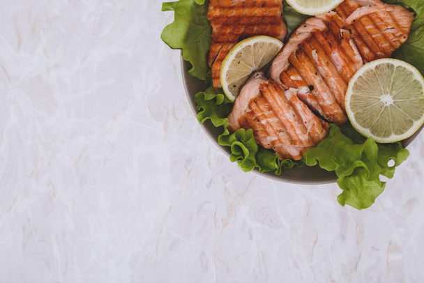 Delicious, grilled salmon on the table - Photo, Image