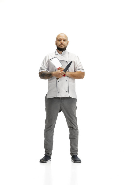 Portrait of a male chef cook, butcher isolated on a white studio background - Fotografie, Obrázek