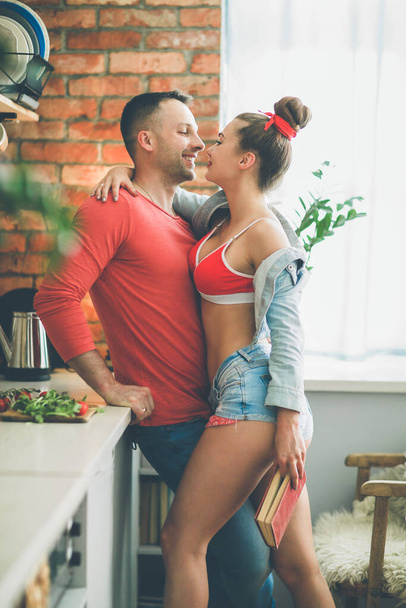 Relationship. Beautiful couple at home - Photo, Image
