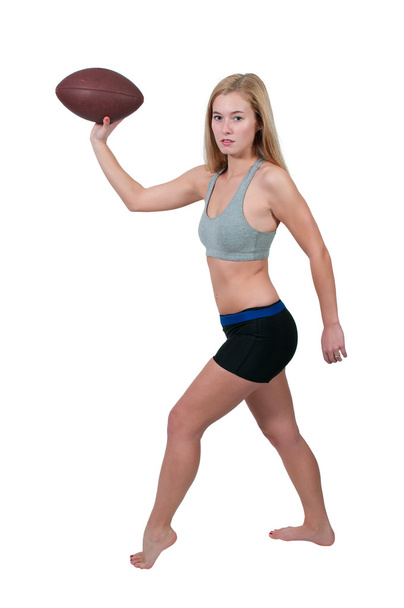 Женщина играет в футбол
 - Фото, изображение